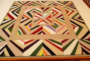 Read more about the article Liberated String Medallion Quilt