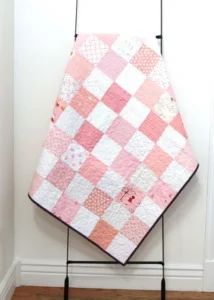 Read more about the article SIMPLE CHECKERBOARD PINK PATCHWORK QUILT